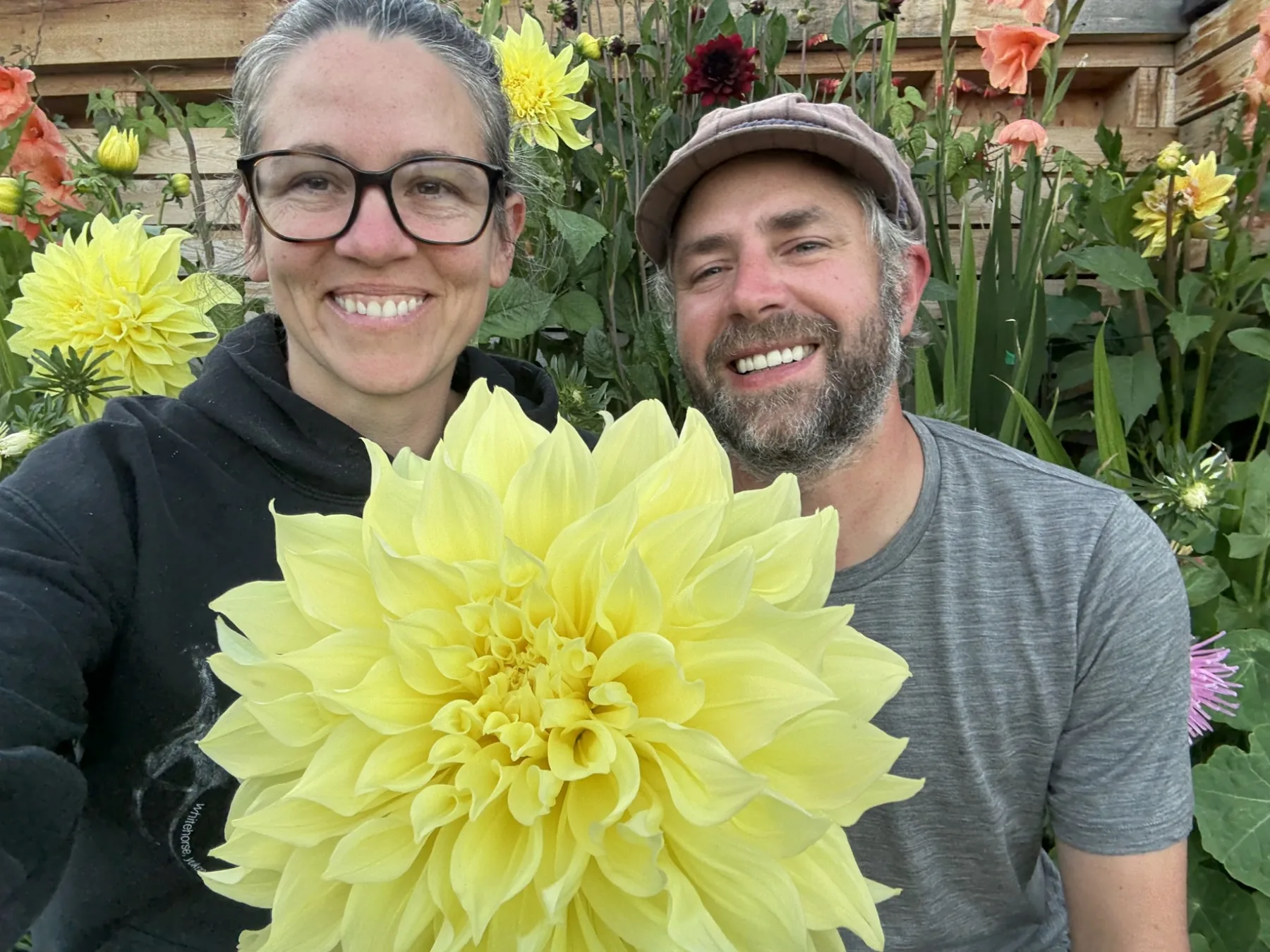 The farm owners in the garden